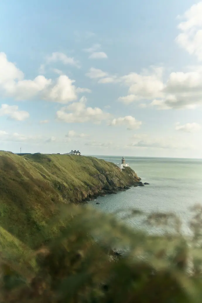 A view of the ocean from the top of a hill